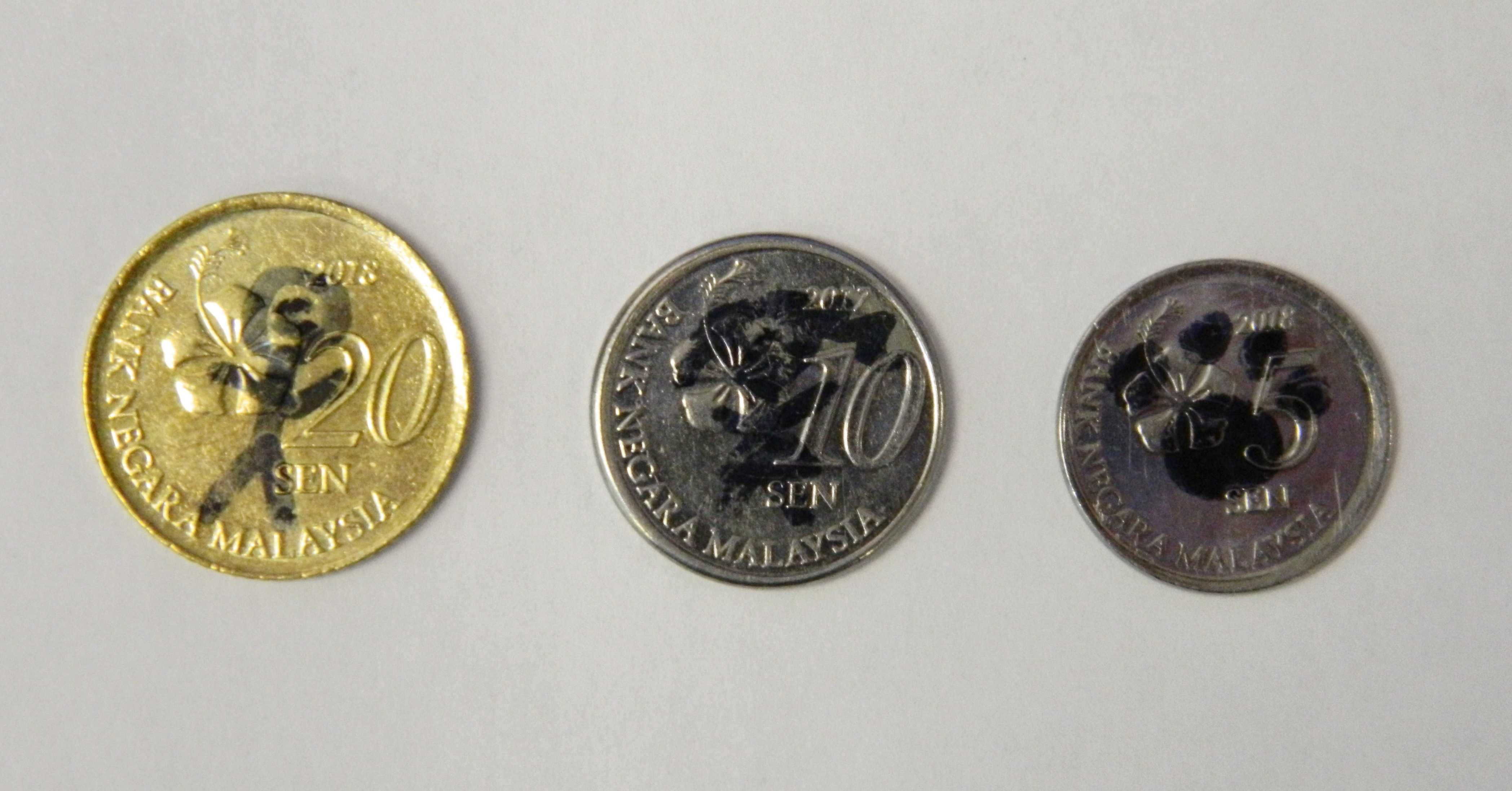 Coins Left at the Statue of Nathan Hale