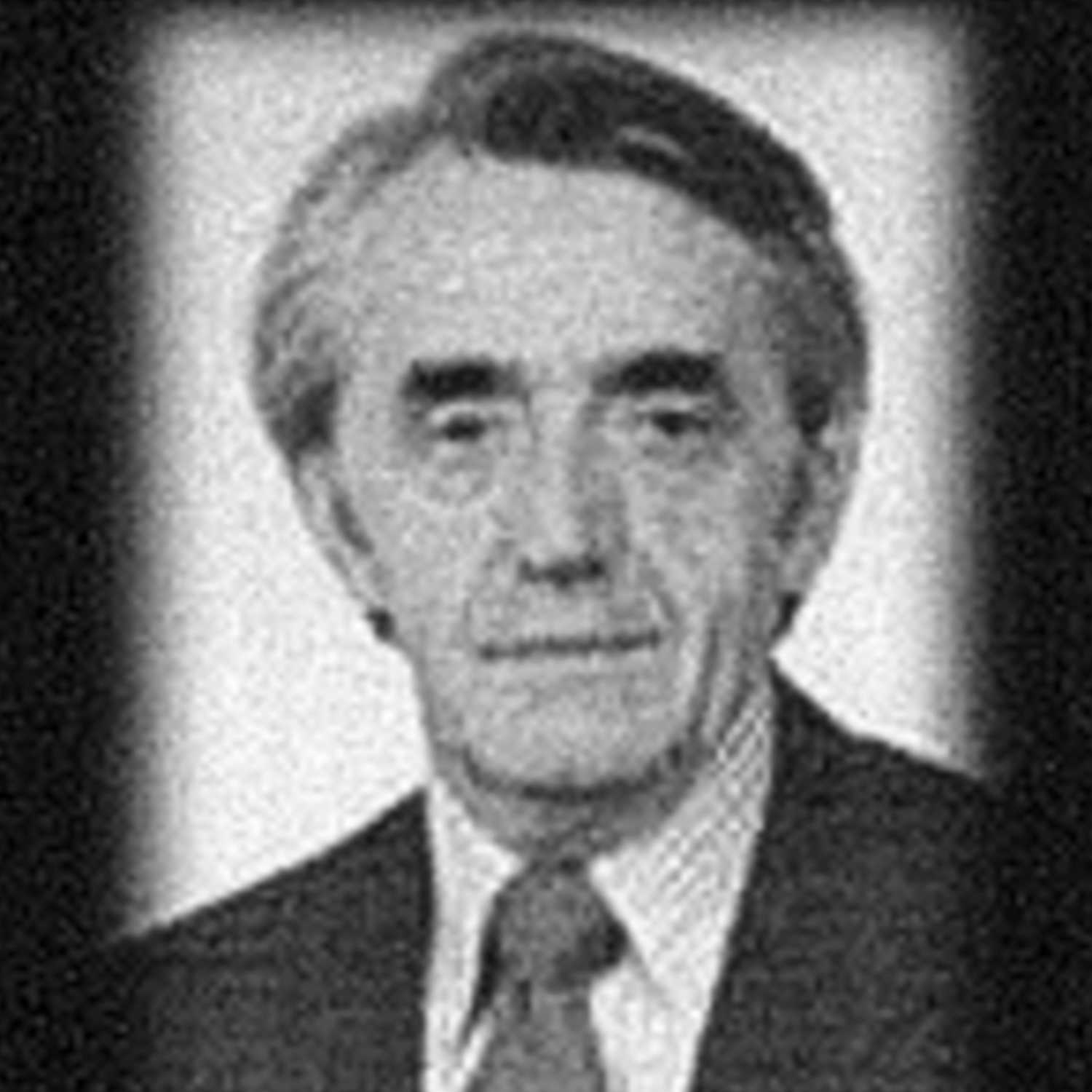 A black and white headshot of William F. Buckley under a banner of four stars.