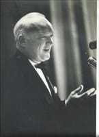 A black and white profile shot of Jim Donovan.