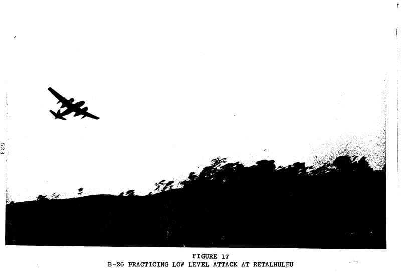 A black and white diagram of a B-26 flying over the ground.