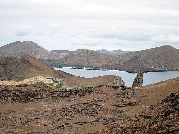 A view of Bartolome Island with the top of Pinnacle Rock showing to the right.