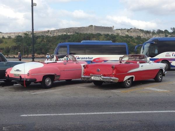 Remarkably well maintained classic cars at a Cuban car park.