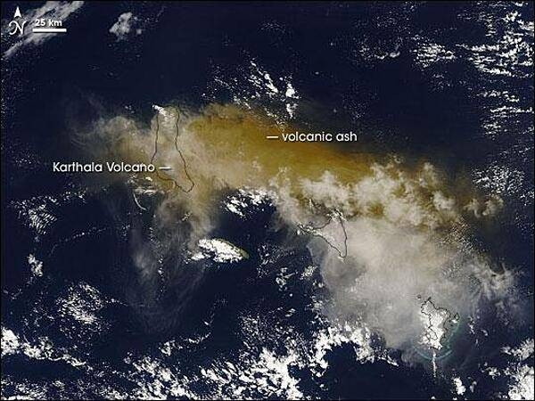 On 24 November 2005, some 2,000 people fled their homes hoping to escape the latest eruption of the Karthala Volcano. The volcano covered nearby villages in ash and locals had little means of protecting their lungs beyond covering their faces with scarves. 

Karthala is one of two volcanoes that make up Grande Comore (or N&apos;gazidja) Island in the Comoros archipelago. These islands lie in the Indian Ocean, between Africa and Madagascar. In this image of 25 November 2005, Grande Comore appears only in outline as material from the eruption completely obscures the satellite&apos;s view of the land surface. The volcanic ash ranges in color from tan to beige; it has spread out around the volcano in all directions, but moves primarily eastward.

With an altitude of 2,361 m (7,746 ft), Karthala is a shield volcano, with smooth slopes built from hardened lava. Comprising the southern portion of Grande Comore Island, Karthala is a regular troublemaker in its neighborhood. The volcano has erupted about 20 times in the last century. Photo courtesy of NASA.