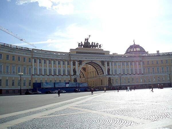 The General Staff Building in Saint Petersburg's Palace Square was built in the 1820s. The arch commemorates the victory over Napoleon; it is topped by a bronze sculpture of Victory herself riding a six-horse chariot. Under the Russian Empire, the West Wing housed the General Staff, while the East Wing contained the Foreign Ministry and the Finance Ministry. The building is now part of the Hermitage Museum.