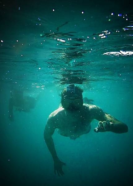 Personnel from US Navy Support Facility Diego Garcia participate in a Morale, Welfare, and Recreation snorkeling excursion in the lagoon. The island lagoon offers an ideal sheltered body of water for a variety of water sports. Photo courtesy of the US Navy/ Mass Communication Specialist 3rd Class Alex Smedegard.