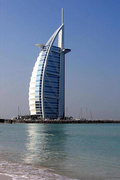 The Burj-al-Arab Hotel in Dubai is one of the world's tallest hotels. Its distinctive shape is meant to mimic an Arab dhow (sailing vessel).