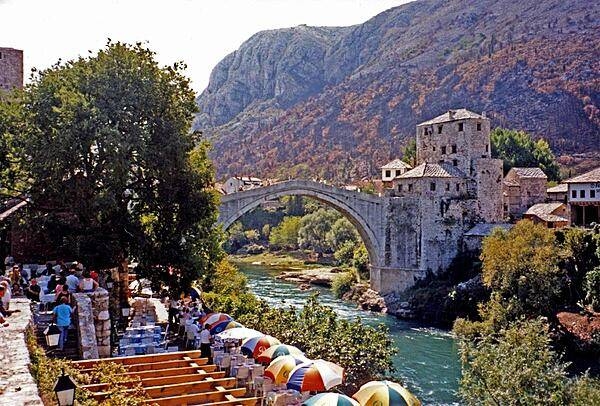 The famous Stari Most (Old Bridge) in Mostar connects the two parts of the city divided by the Neretva River. Built during the 16th century under Ottoman Sultan Suleiman the Magnificent, the bridge was destroyed in 1993 during the Bosnian War, but was subsequently rebuilt and reopened in 2004. A UNESCO World Heritage Site, the elegant bridge - a model of Balkan Islamic architecture - is the most visited tourist site in the city.