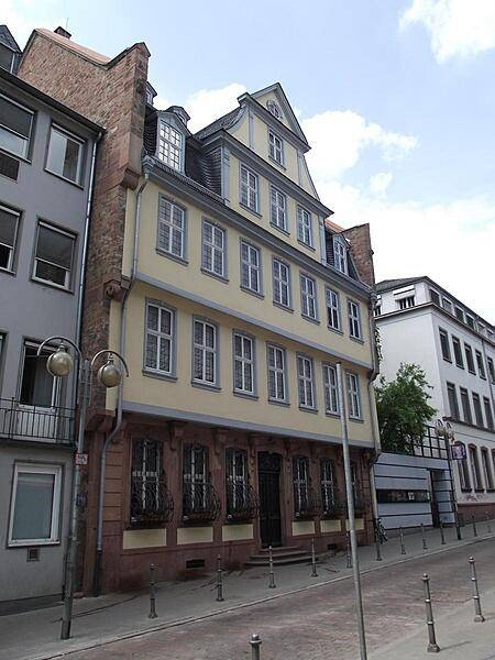 The Goethe House at 23 Grosser Hirschgraben in the old town of Frankfurt was the residence of the Goethe family until 1795. The family's most notable personality, Johann Wolfgang von Goethe, was born there in 1749, lived there till the age of 16, and returned sporadically throughout his life. The house stands next to the Goethe Museum (on the right).