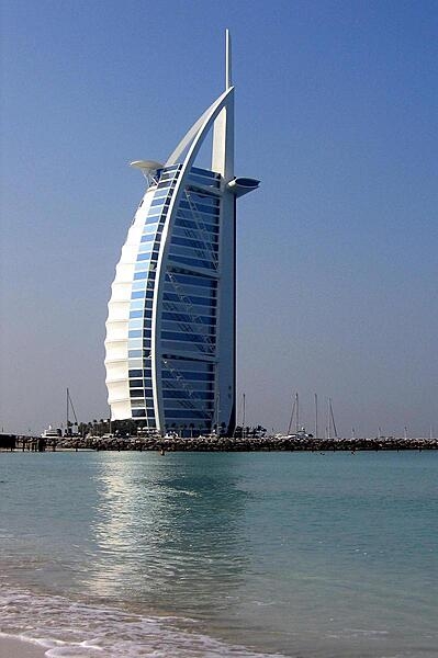 The Burj-al-Arab Hotel in Dubai, UAE, is one of the world's tallest hotels. Its distinctive shape is meant to mimic an Arab dhow (sailing vessel).