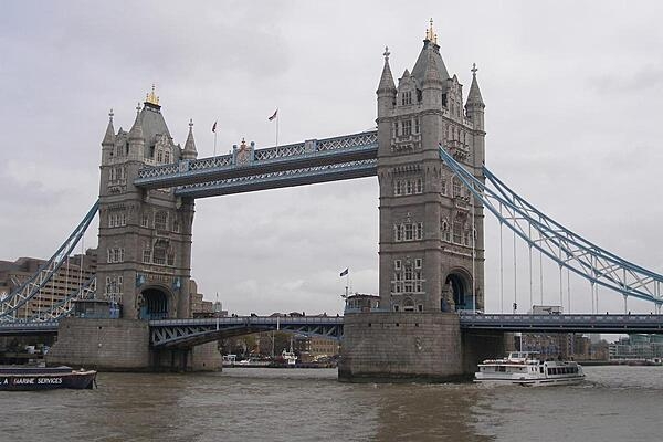 Tower Bridge over the River Thames in London, United Kingdom, gets its name from the nearby Tower of London. Opened in 1894, it has become an iconic symbol of the city.