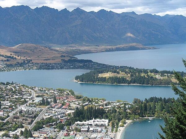 The resort town of Queenstown on New Zealand's South Island is known for its adventure tourism and ski tourism. This photo was taken from one of the hills around the town, looking southeast across the harbor.
