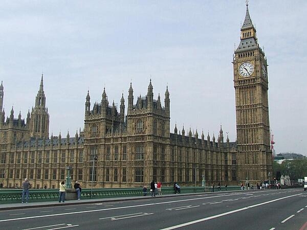The Houses of Parliament building in Westminster, London, United Kingdom, is home to the famous clock tower that houses “Big Ben.” The bell was named for Sir Benjamin Hall, who oversaw the latter stages of the rebuilding of the Houses of Parliament after the 1834 fire.