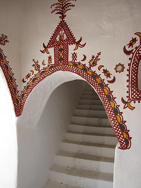 The traditionally decorated mud brick architecture of Ghadames&apos; Old City is designed for natural cooling.  Buildings are built directly adjacent to each other, which insulates the streets and living spaces below from the beating sun.