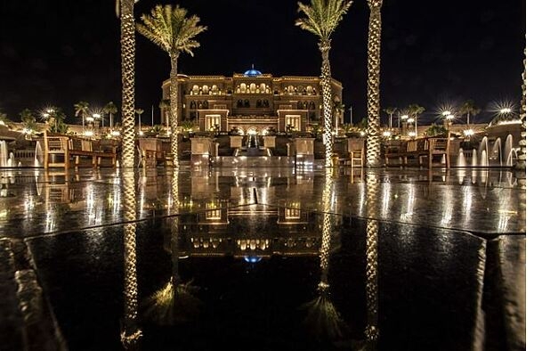 The Emirates Palace is a luxury hotel in Abu Dhabi.  Built between 2001 and 2005, the hotel displays a mix of Islamic architectural elements complemented by modern design and construction. The central dome features elaborate geometrical patterns. The color of the building was inspired by different shades of sand in the Arabian Desert. The hotel hosts a 1.2-km long beach.