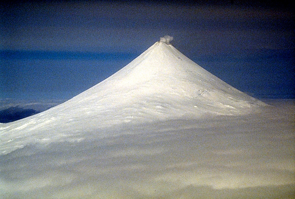 Often compared to Mount Fuji in Japan, the Shishaldin volcano located on central Unimak Island in the Aleutian Islands rises 2,857 m (9,373 ft) above sea level. The volcano has had several historical eruptions, and a summit crater emits a nearly continuous plume of steam. Image courtesy of the USGS.