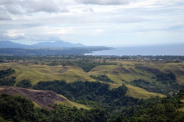 Rugged grassy ridges known as the Sea Horse and the Galloping Horse can be seen from the top of a hill known as the Gifu or Mount Austen on Guadalcanal. This area was the scene of intense fighting from December 1942 to January 1943 as US Army units fought entrenched Imperial Japanese Army forces in what was the last major land battle of the Guadalcanal Campaign. Photo courtesy of the US Army/ Staff Sgt. Armando R. Limon.