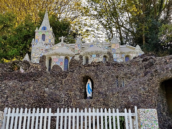 The Little Chapel in Guernsey was built in 1914 using donated pieces of china, seashells, and pebbles by a monk who wanted to create a miniature version of the Shrine of Our Lady at Lourdes (France).  Much of the broken china was donated by the Wedgewood and Royal Doulton companies. The chapel has room for about eight people and has been described as "probably the biggest tourist attraction in Guernsey."