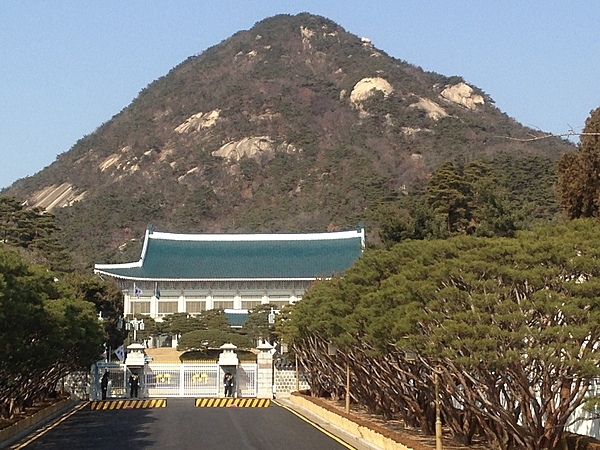 Close view of Cheongwadae, or the Blue House (literally "pavilion of blue tiles”), the former executive office and official residence of the president of the Republic of Korea. In 2022, the president of South Korea moved his residence to the Ministry of National Defense Building in Seoul. Cheongwadae and its grounds were converted into a public park and opened to visitors for the first time in the country's history.