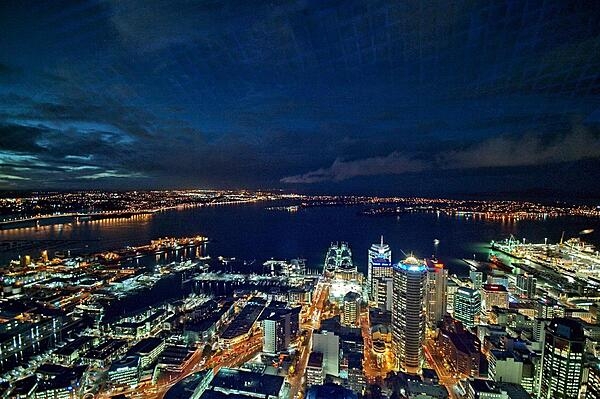 The city of Auckland, the largest in New Zealand, is home to almost a third of the country&apos;s population. This is a view of the North Island city at night as seen from its tallest tower.