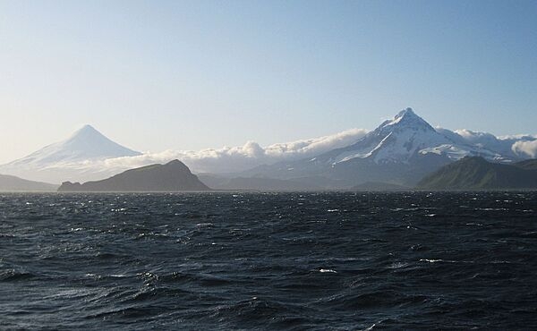 Shishaldin (left) and Isanotski volcanoes on Unimak Island, Alaska, Aleutian Islands, in the Pacific Ocean. Photo courtesy of NOAA /  Second Mate Michael Theberge.