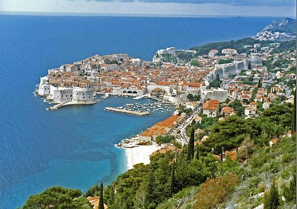 The beautiful port city of Dubrovnik on the Adriatic Sea. During the Middle Ages this maritime city-state (then called Ragusa) rivaled Venice for supremacy in the Adriatic. Walking along the crest of the massive walls that encircle most of Dubrovnik is an exhilarating, breathtaking experience. In 1979, the city became a UNESCO World Heritage Site.