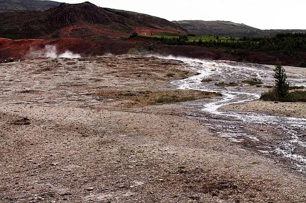 A geyser field and stream runoff.