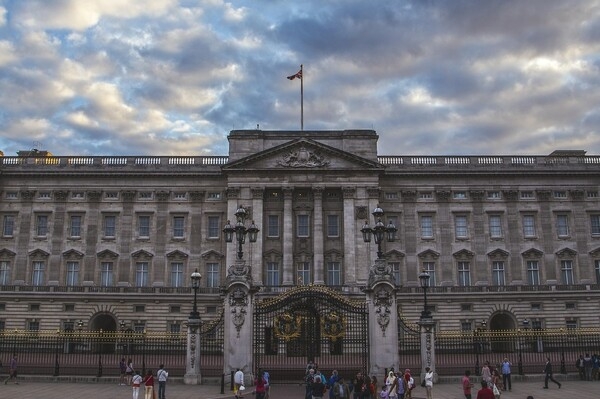 Buckingham Palace is the official residence and administrative headquarters for the monarch of the United Kingdom. The first Duke of Buckingham had the original townhouse built in 1703, and King George III purchased the house in 1761. Queen Victoria was the first sovereign to make the enlarged palace her residence in 1837. The palace now has 775 rooms that include 19 state rooms, 52 royal and guest bedrooms, 188 staff bedrooms, 92 offices, and 78 bathrooms.