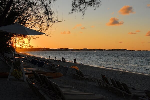 Golden sunset along a strand of beach on Providenciales Island.