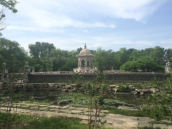 The Summer Palace is a vast ensemble of lakes, gardens, and palaces in Beijing, China. It was an imperial garden during the Qing dynasty (1644-1912). This view shows a folly on the grounds.