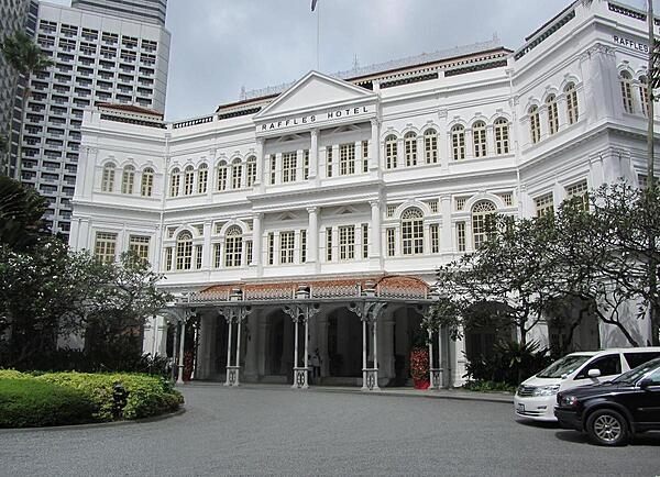 The Raffles Hotel in Singapore was founded in 1887; it was named for Stamford Raffles, the founder of modern Singapore. The Singapore Sling, widely regarded as the national drink, was first created in 1915  by Raffles bartender Ngiam Tong Boon. Primarily a gin-based cocktail, the Singapore Sling also contains pineapple juice, lime juice, Curacao, and Benedictine. At a time when it was considered improper for ladies to consume alcohol in public, the ingenious bartender made the beverage pink with grenadine and cherry liqueur to give it a feminine flair and to resemble fruit juice. The disguise worked, leading people to think it was a socially acceptable drink for women. And so, the Singapore Sling was born.