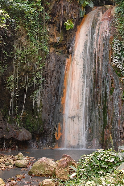 Santa Lucia's Diamond Falls  in Diamond Botanical Gardens gets its color from minerals in the water.