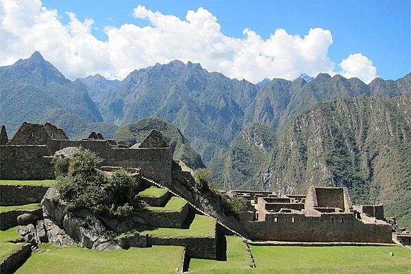 Houses near the Sacred Plaza of Machu Picchu in Peru, approximately 2,430 m (7,970 ft) above sea level.