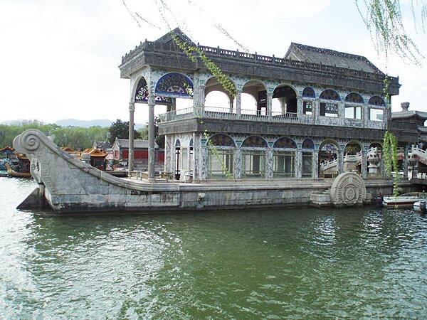 The Marble Boat, which is also known as The Boat of Purity and Ease, is a wooden pavilion in the shape of a paddle steamer that is painted to imitate marble, located at the Summer Palace in Beijing, China. It was originally built in 1755, but it was destroyed in 1860 during the Second Opium War and reconstructed in 1893.