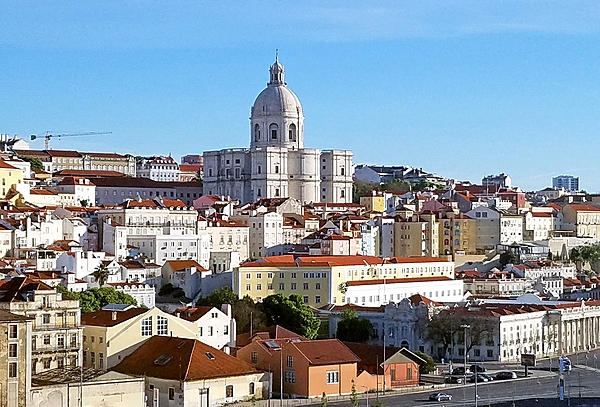 Lisbon, Portugal's capital and largest city, is often called the “White City" due to the ochre stone used in its buildings that looks white in bright sunlight. At the center of this photo is the 17th-century Church of Santa Engracia, which was converted into a national pantheon in the 20th century .