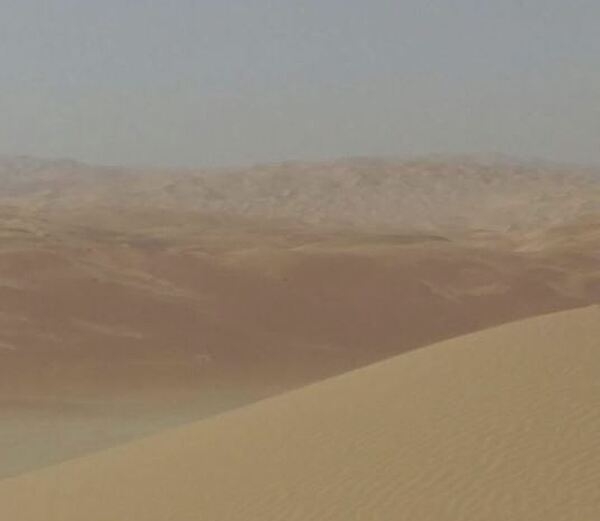 South and west of Abu Dhabi, UAE, sand dunes merge into the Rub' al Khali (Empty Quarter), a sand desert encompassing the southern third of the Arabian Peninsula (including southern Saudi Arabia, and areas of Oman, the United Arab Emirates, and Yemen). The desert covers about 650,000 sq km (250,000 sq mi).