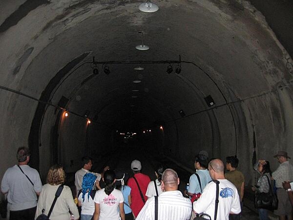 Inside the Malinta Tunnel complex on the island of Corregidor in the Philippines. During the Battle of Corregidor (1941-42) one of the lateral tunnels served as US General Douglas MacArthur's headquarters, while another lateral served as the seat of government for the Commonwealth of the Philippines.