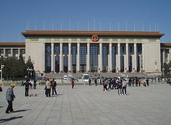 In front of the Great Hall of the People in Tiananmen Square in Beijing.