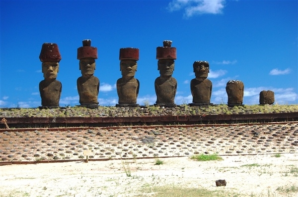 Moai with red topknot hats at Anakena Ahu Na on Easter Island (Rapa Nui). Image courtesy NOAA / Elizabeth Crapo.