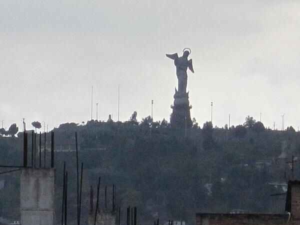 The Virgin of the Apocalypse statue overlooking historic Quito from El Panecillo hill.