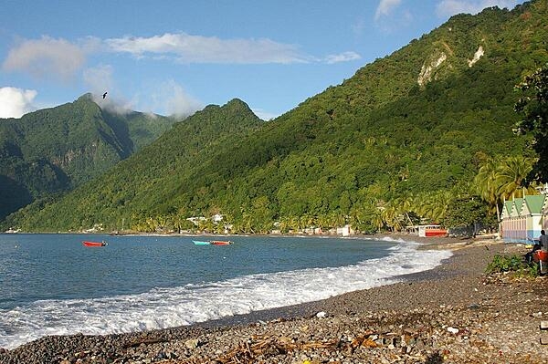 View of the south side of the island. Dominica features lush mountainous rain forests, and is the home of many rare plant, animal, and bird species (including the Sisserou Parrot featured on its flag).