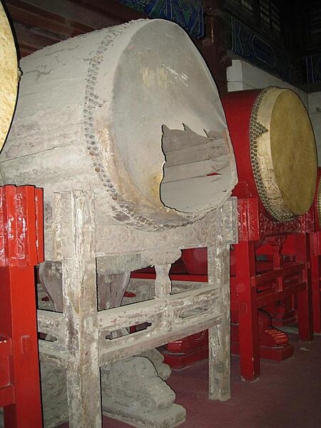 The Drum Tower in Beijing, China, was built in 1272 and rebuilt twice after fires. It originally contained one large drum and 24 smaller drums that were used to keep track of time. The Drum Tower is 47 m high and located to the north of the Forbidden City.