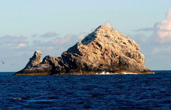 The guano-covered Gardner Pinnacles (also called Pūhāhonu in Hawaiian) are two rock outcrops surrounded by a reef and located in the Hawaiian Islands about 950 km (590 mi) northwest of Honolulu. Photo courtesy of NOAA / Andy Collins.