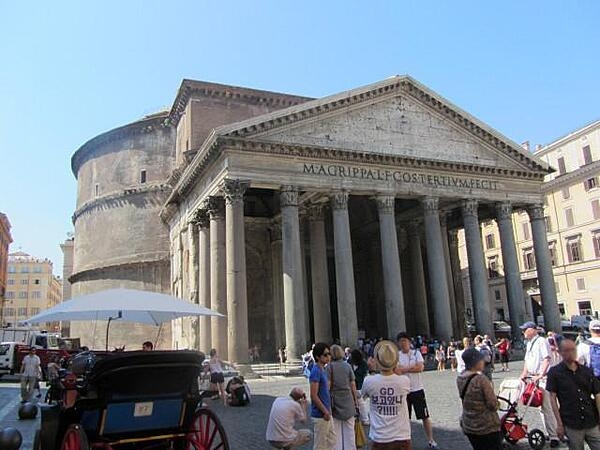 The Pantheon in the Plaza della Rotonda in Rome, Italy, dating from about A.D. 126 when the Emperor Hadrian rebuilt it over Marcus Agrippa's original temple dating from 27 B.C. The name comes from the Greek words "pan" (all) and "theos" (god). The Pantheon has been a Christian church since about 608.